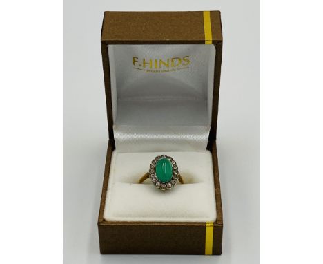 9ct gold gold ring set with a green stone, size M, 2.6g.. Estimate: £40-60