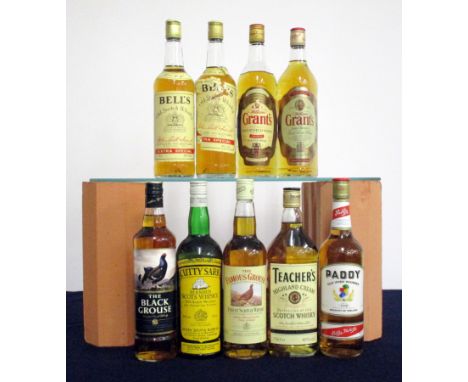 2 75-cl bts Bells Extra Special Old Scotch Whisky 40% 1 torn label 2 70-cl bts Grants Family Reserve Finest Scotch Whisky 40%