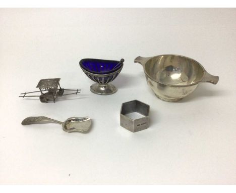 Group of silver, including a porringer, pierced oval salt with liner and spoon, Chinese rickshaw, and a shovel-form caddy spo