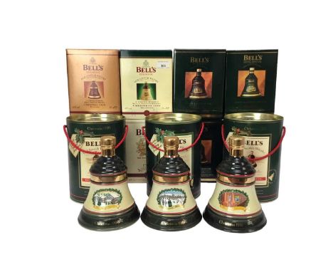 Eleven bottles, Bell's Extra Special Old Scotch Whisky Christmas Decanters, 1989-1991 and 1994-1999, in original boxes
