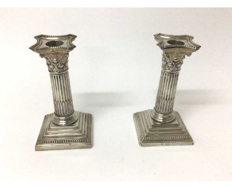 Pair of late Victorian silver Corinthian column candlesticks, London 1900, William Hutton &amp; Sons, 15cm highIn good antiqu