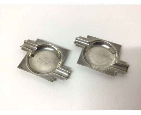 Pair of Edward VIII Art Deco silver ash trays with engine turned decoration (Birmingham 1936), together with a silver matchbo