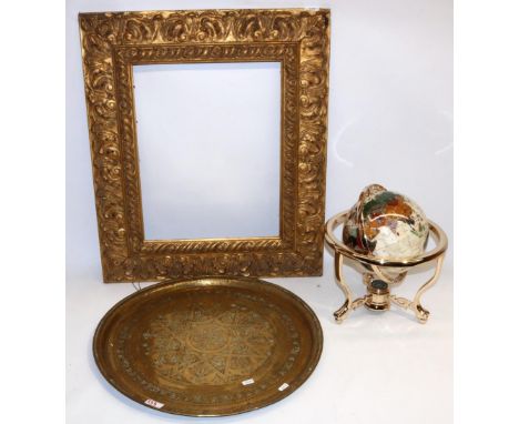 Gem and shell set globe in brass effect frame, H33cm; large gilt picture frame, 66cm x7 6cm, and a large circular brass tray 