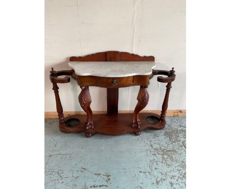Victorian mahogany hallstand, with white marble serpentine top above single drawer and two stick compartments, on claw and ba