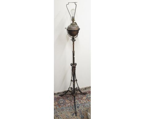 Late C19th wrought iron and brass rise and fall oil lamp (converted to electric) and wrought iron light fittings (3) 