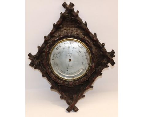 J. Brown, 76 St. Vincent St., Glasgow - early C20th oak aneroid barometer and thermometer, in carved rustic and basket weave 