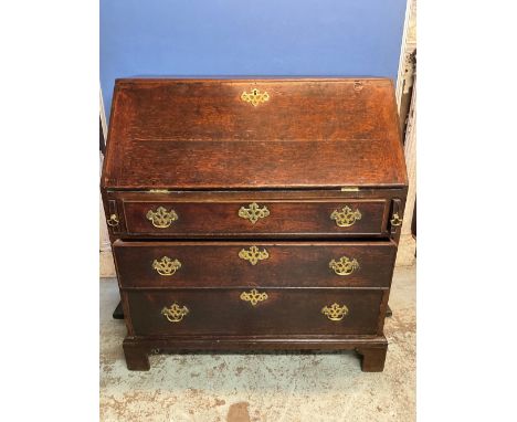 Geo.111 oak bureau, slope fall front above three cock beaded drawers, brass swan neck handles on bracket feet, W90cm D49cm H9