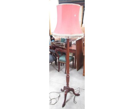 George 111 style mahogany tripod standard lamp with lobed and fluted column and pink fringed shade, HJ185cm max 