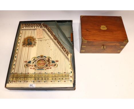 Satinwood writing box with fitted interior, L30cm; and an early C20th mandolin harp, made in Saxony, L53cm (2) 