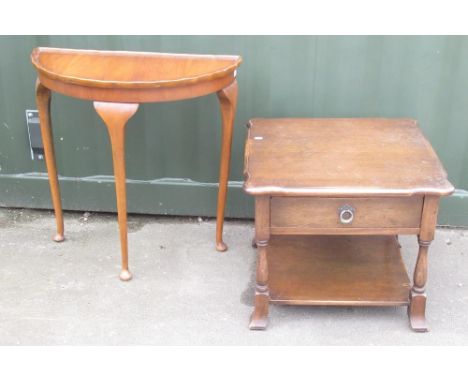 C20th distressed oak two tier coffee table with drawer, possibly Bevan Funnell, and a Reprodux walnut D shaped console table 