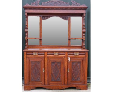 Victorian oak mirror back sideboard, with arched cornice and three mirror plates above three drawers with brass handles and t