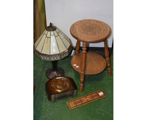 An oak Smiths mantel clock with key; a pokerwork stool, undertier, turned legs; a decorative table lamp; a cribbage board (4)