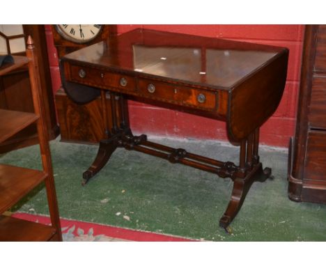 A Regency reproduction mahogany sofa table