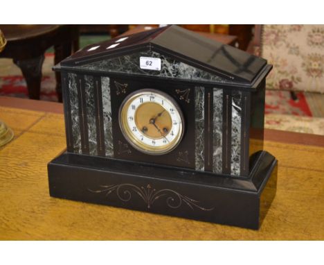 A black slate mantel clock, architectural pediment inlaid with variegated marble, brass dial, enamelled chapter ring, Arabic 