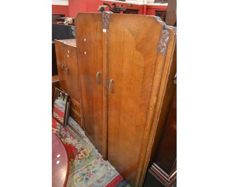 A 1940's two piece bedroom suite comprising double wardrobe, and tallboy