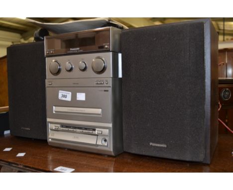 A Panasonic CD stereo; a JVC stereo; speakers; tripod; a quantity of records 