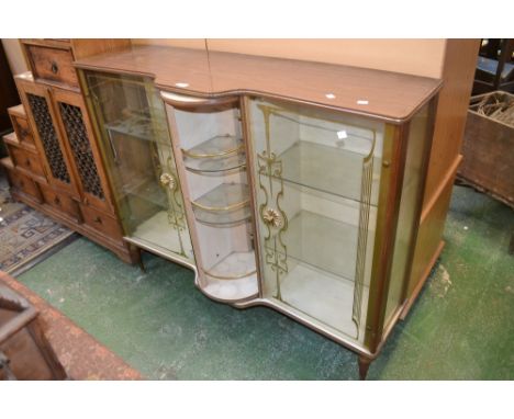 A 1950's breakfront china cabinet  central mirrored revolving section flanked by two glazed door cupboards; a reproduction fl