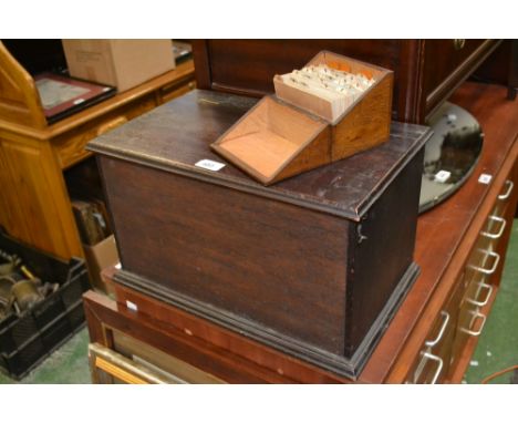 A mahogany hinged box and cover, a small 1920's oak box and cover for index cards (2)