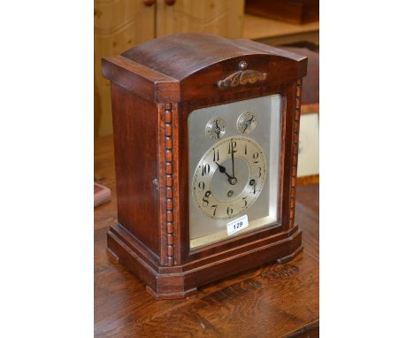 An Edwardian oak cased  Westminster chime bracket clock, by  Junghans, silvered dial, Arabic numerals, three winding holes, 3