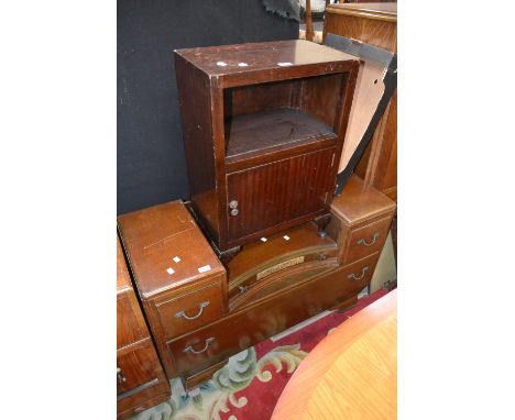 A 1940's walnut veneer dressing table; a 1940's oak dressing table; pot cupboard (3)