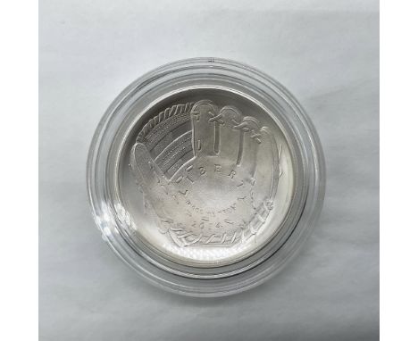 Philadelphia Mint. Commemorative issued coin. The obverse side depicts an open baseball glove. The reverse side features base