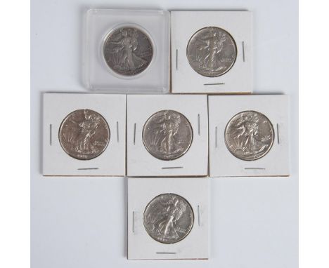 A U.S. silver coin minted from 1916 to 1947, depicting Liberty striding forward with branches in hand and the U.S. flag drape