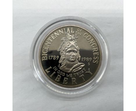San Francisco Mint. Half-Dollar Proof. The obverse side depicts a close-up image of the Statue of Freedom, a bronze statue de