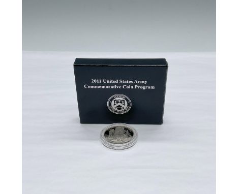 Commemorative coin. The obverse side depicts a U.S. Army soldier surveying, two servicemen building a flood wall, and a Redst
