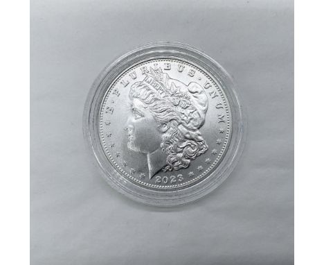 Philadelphia Mint. The obverse side features Liberty in profile. She is shown in cap, flora, and crown. The reverse side depi