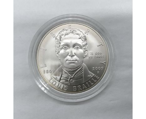 Philadelphia Mint. Commemorative issued coin, celebrating the 200th anniversary of Louis Braille's birth. The obverse side fe