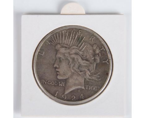 A United States silver coin minted for circulation from 1921 through 1935 featuring the Goddess of Liberty in profile on the 