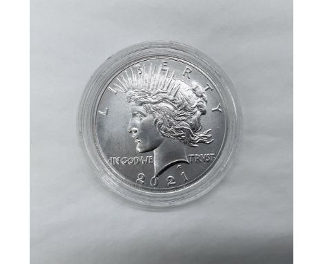Philadelphia Mint. The obverse side features the profile of Liberty in a radiant crown, and the reverse side depicts an eagle
