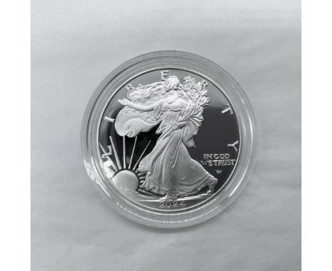 West Point Mint. The obverse side features full length of Liberty in stride. She is shown wrapped in the folds of the flag of