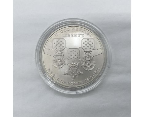 San Francisco Mint. Commemorative issued coin. The obverse side depicts the three current Army, Navy, and Air Force Medals of