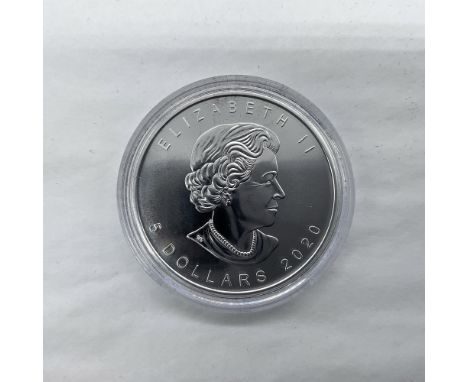 Winnipeg Mint. The obverse side features Queen Elizabeth II. The reverse side depicts a sugar maple leaf. The coin is in a pr
