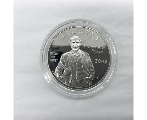 Philadelphia Mint. A commemorative issued coin, celebrating the 125th anniversary of the light bulb. The obverse side depicts