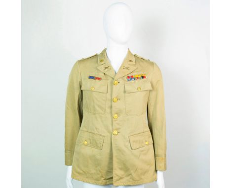 Light-weight US Army tan overcoat with Great Seal Eagle brass buttons, ribbons over right pocket, and ribbon bars over left p