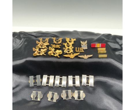 Gorgeous collection of Army and Navy pins that features a variety of distinctive symbols and emblems such as captain bars, se