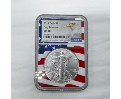 NGC Slabbed Early Releases. The obverse side features full length of Liberty in stride. She is shown wrapped in the folds of 