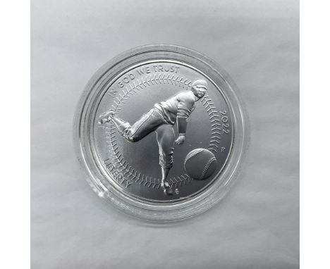 Philadelphia Mint. The obverse side depicts a pitcher in mid-throw. The reverse side depicts a player's point of view of a pi