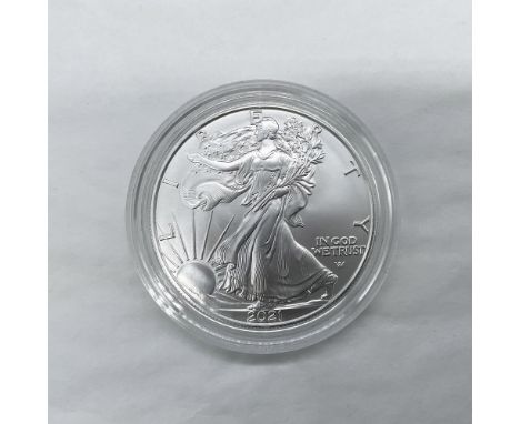 West Point Mint. The obverse side features full length of Liberty in stride. She is shown wrapped in the folds of the flag of