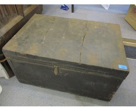 A Victorian leather bound travelling trunk with twin carrying handles 