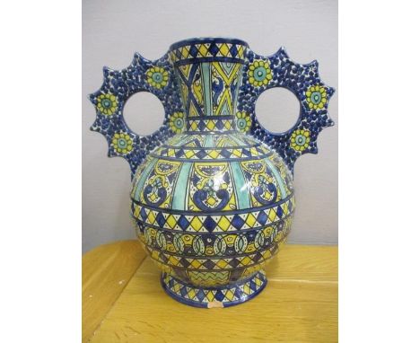 A Cantagalli twin handled vase painted with geometric panels and flower heads, A/F, 10 3/4"h 