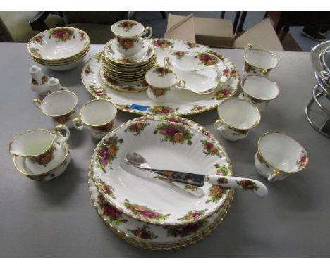 A Royal Albert Country Roses part tea and dinner service comprising 37 pieces 