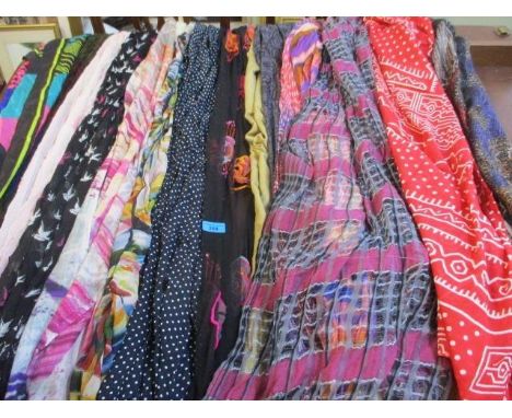 A selection of ladies scarves to include silk and cashmere examples, a Guggenheim Museum scarf in multi-colours, Camelia Jame