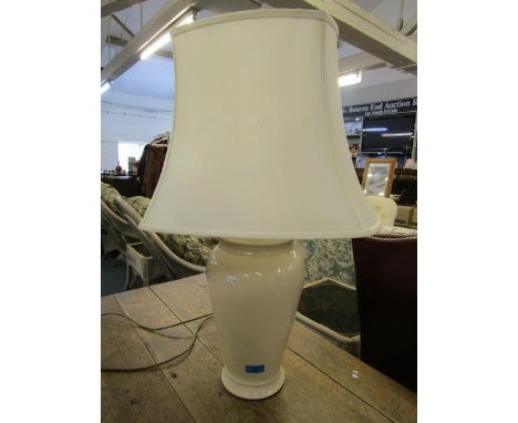 A contemporary cream crackle glazed table lamp with a fabric shade 