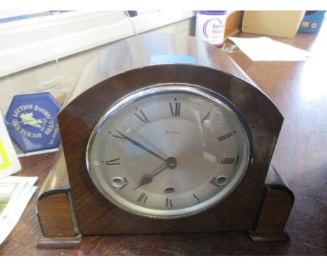 An Art Deco mantle clock, the silvered dial inscribed Betima 
