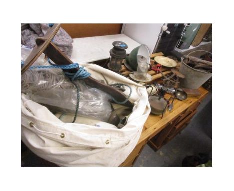 A mixed lot to include boat-related items, a galvanized bucket, weighing scales, oil lamps and other items