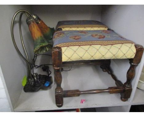 A modern Art Nouveau style metal and composition lamp and a pair of oak stools 