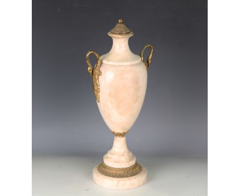 A late 20th century cream marble and gilt metal mounted table lamp, height 44cm.Buyer’s Premium 29.4% (including VAT @ 20%) o